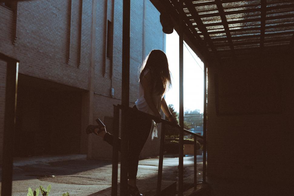 Free Stock Photo Of Woman Standing On Porch Next To Fire Hydrant