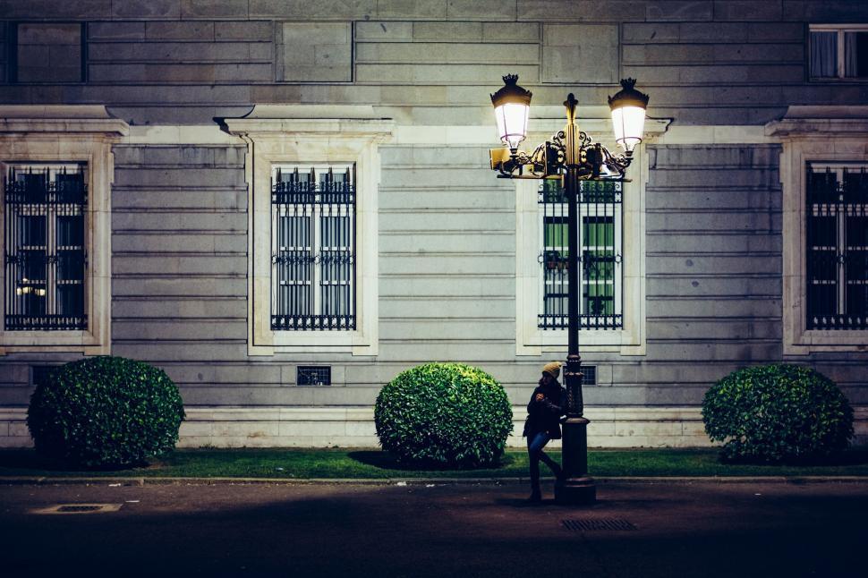 Free Stock Photo Of Person Sitting On Bench In Front Of Building