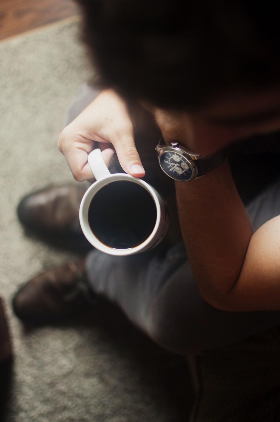 Free Image of Person Holding Cup of Coffee 