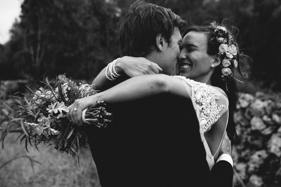 Free Image of Man and Woman Embracing Each Other 