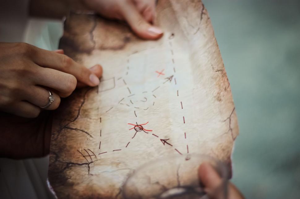 Free Image of Person Holding Piece of Paper With Writing 