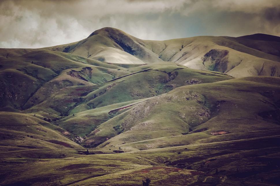 Free Image of Majestic Mountain Range With Cloudy Sky 
