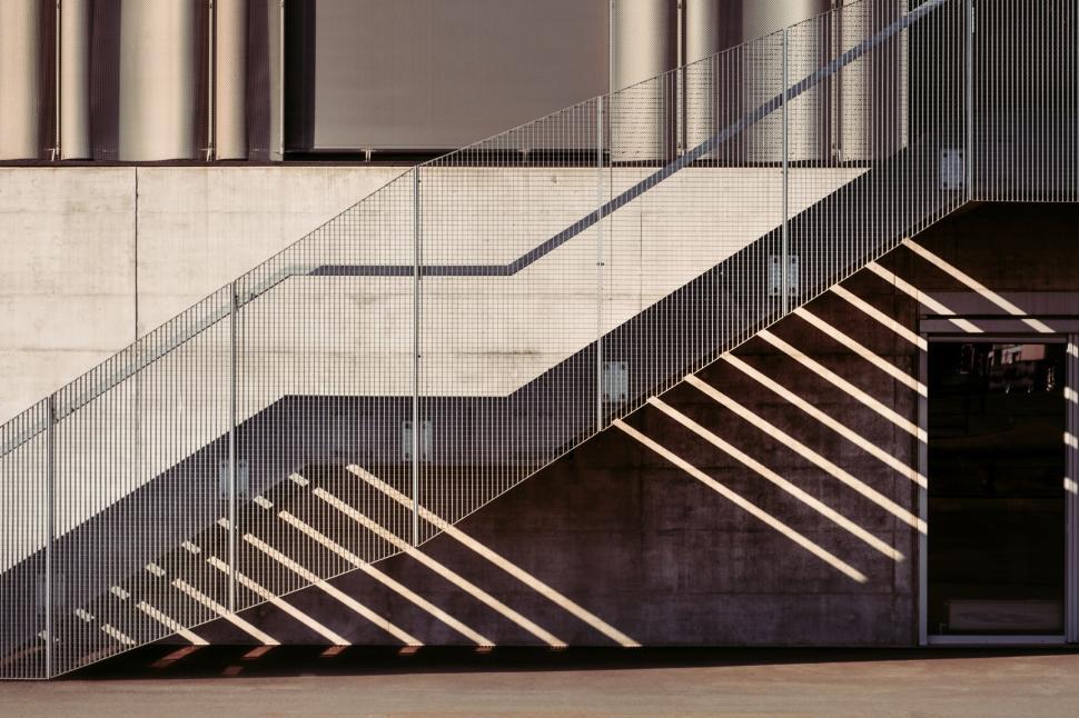 Free Image of Man Riding Skateboard Down Set of Stairs 