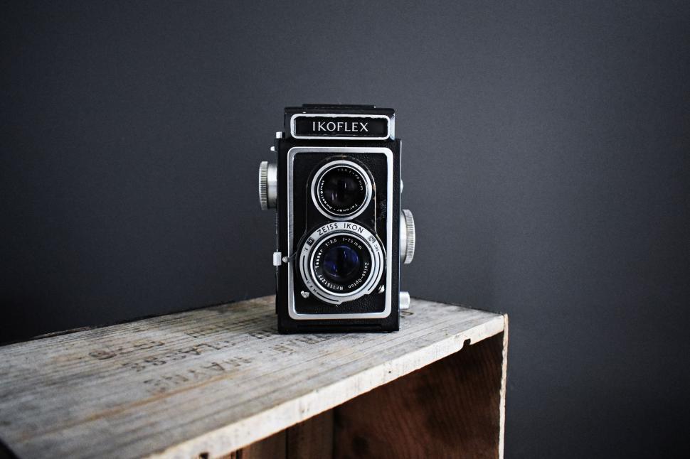 Free Image of Vintage Camera on Wooden Table 