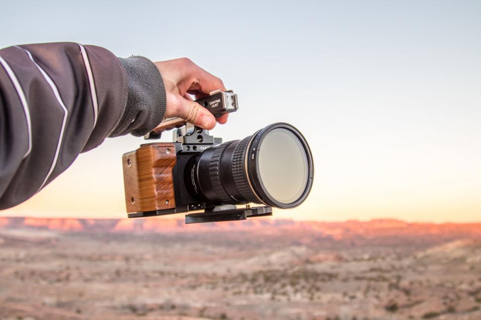 Free Image of Person Holding Camera 