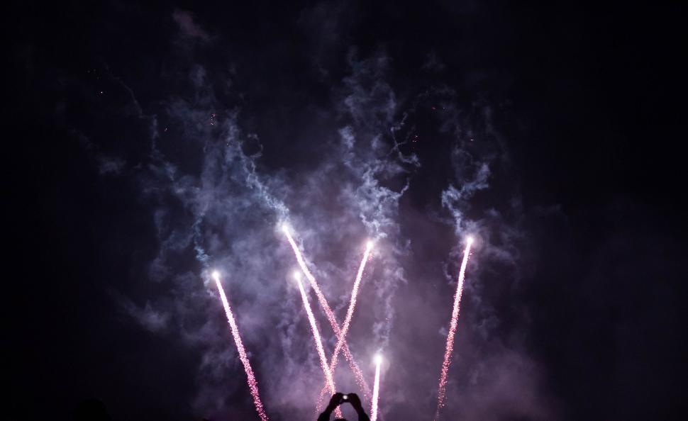 Free Image of Person Standing in Front of Firework Display 