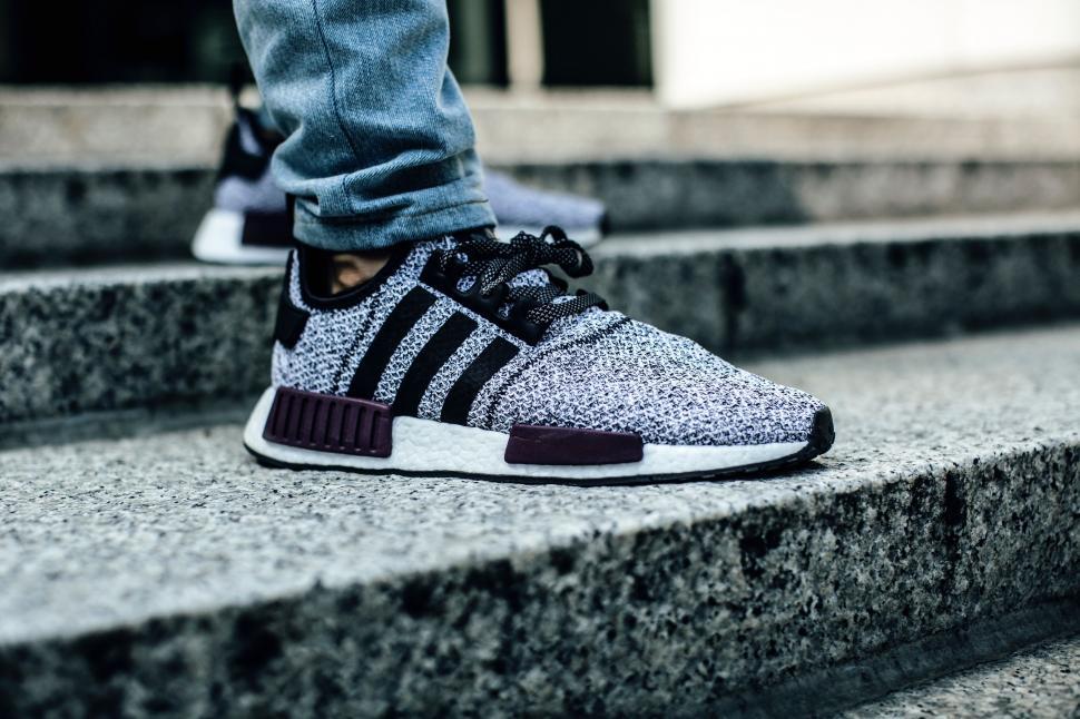 Free Image of Person Standing on Steps Wearing Sneakers 