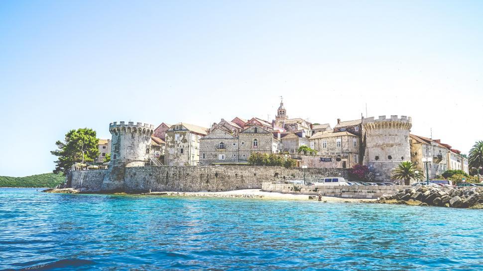 Free Image of Castle on an Island in the Middle of the Ocean 