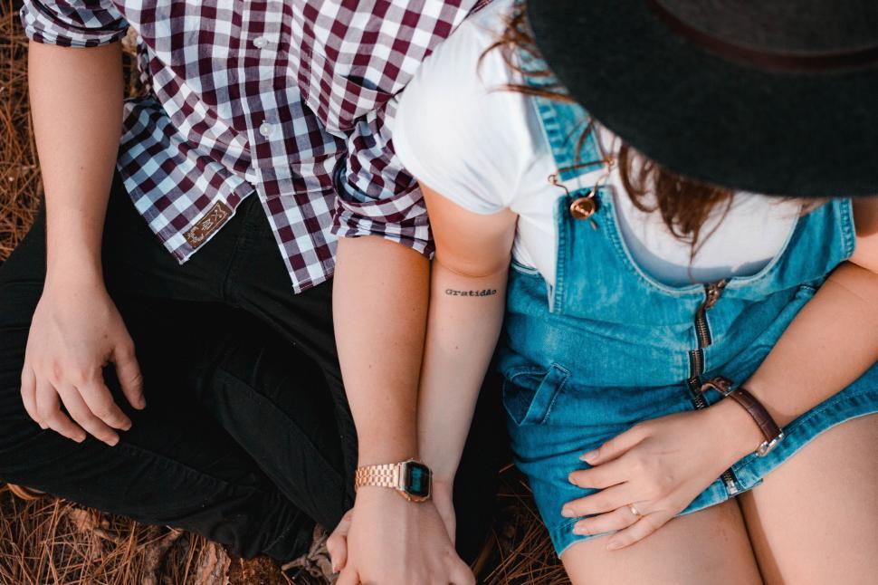 Free Image of Man and Woman Sitting Together 
