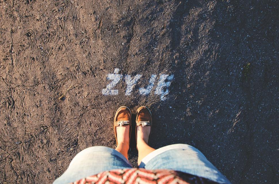 Free Image of Person Relaxing With Feet Up on Skateboard 