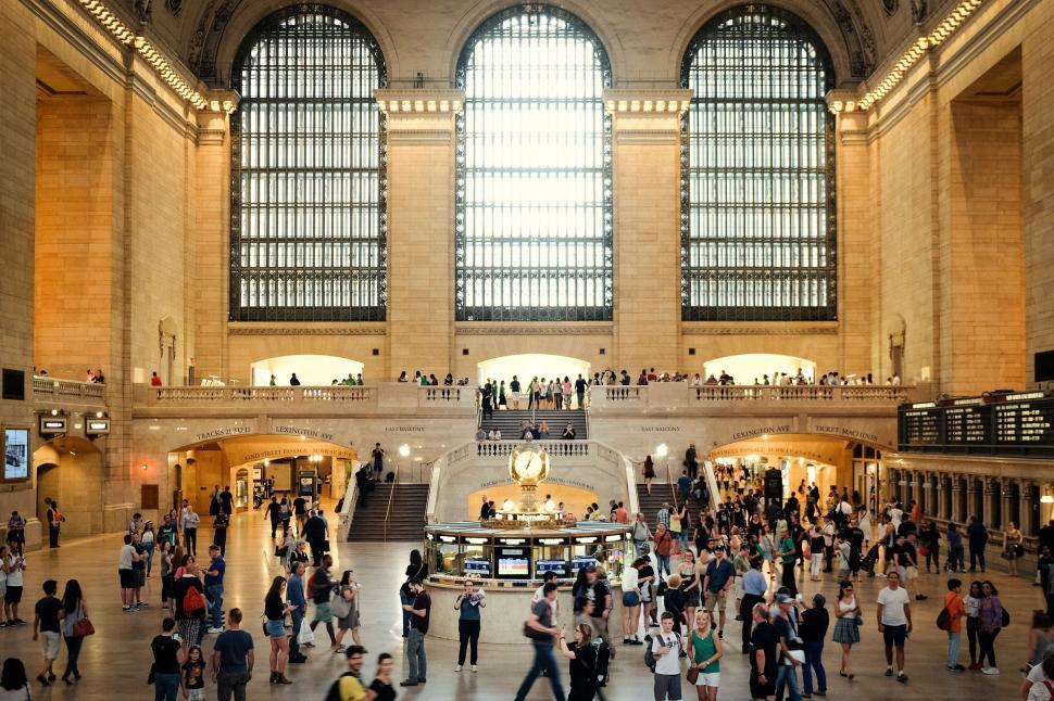 Free Image of Large Group of People Inside of a Train Station 