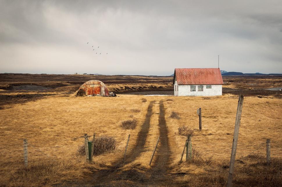 Free Image of House Standing Amidst Field 