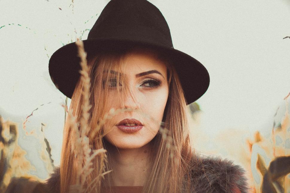 Free Image of Woman Wearing Black Hat and Fur Coat 