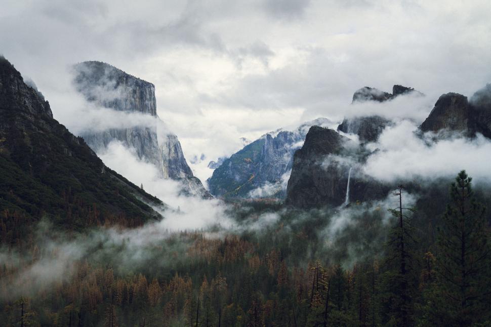 Free Image of Clouds Covering Mountain Range 