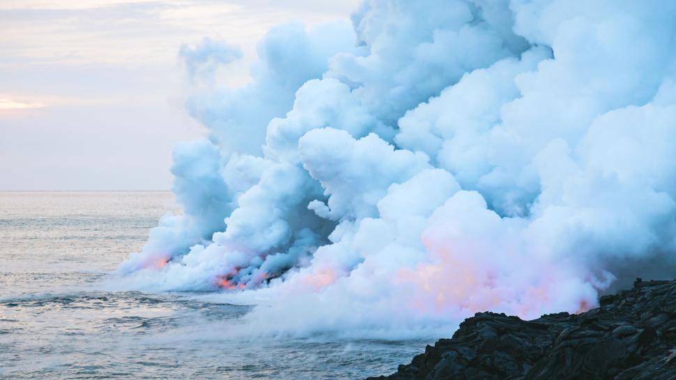 Free Image of Large Plume of Smoke Emerging From Ocean 