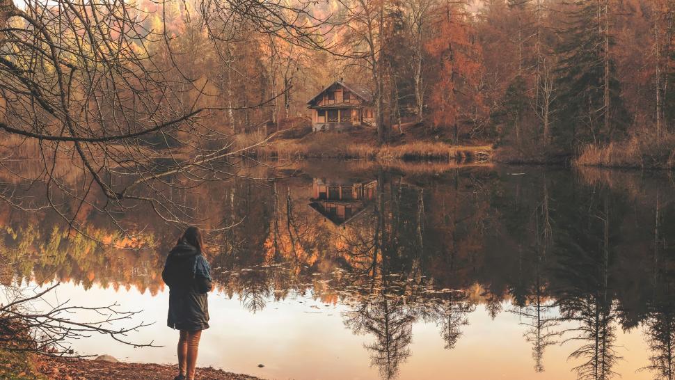 Free Image of Person Standing Near Body of Water 