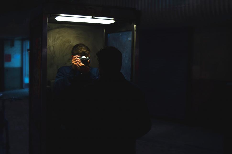 Free Image of Man Taking a Picture of Himself in a Mirror 
