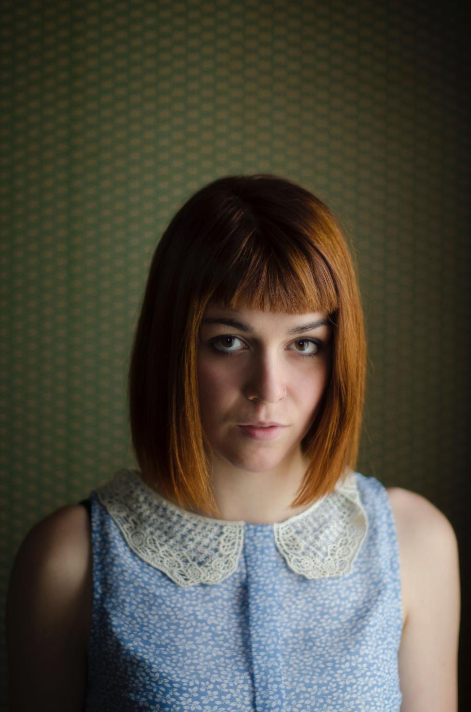 Free Image of Woman With Red Hair and Blue Dress 
