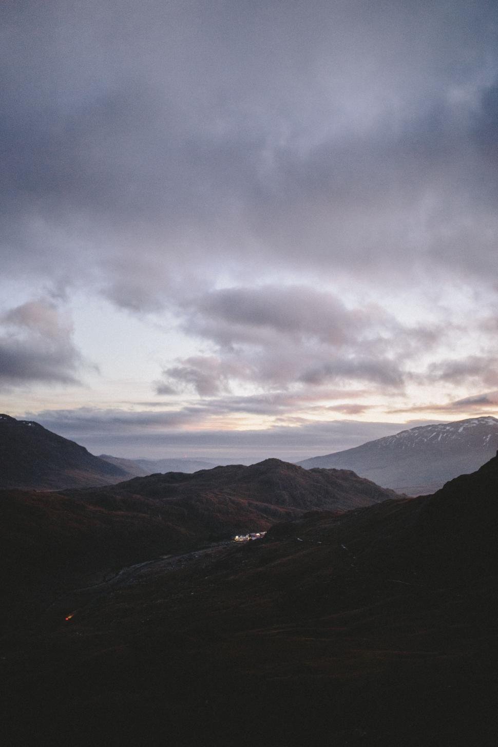 Free Image of Cloudy Sky Over Mountain Range 
