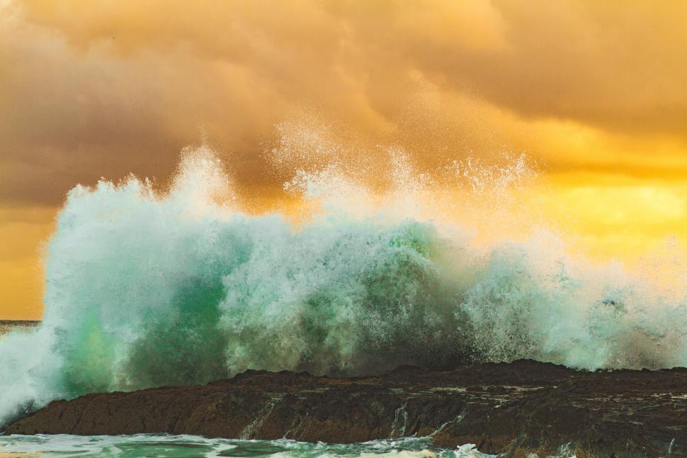 Free Image of Man Riding Surfboard on Ocean Wave 