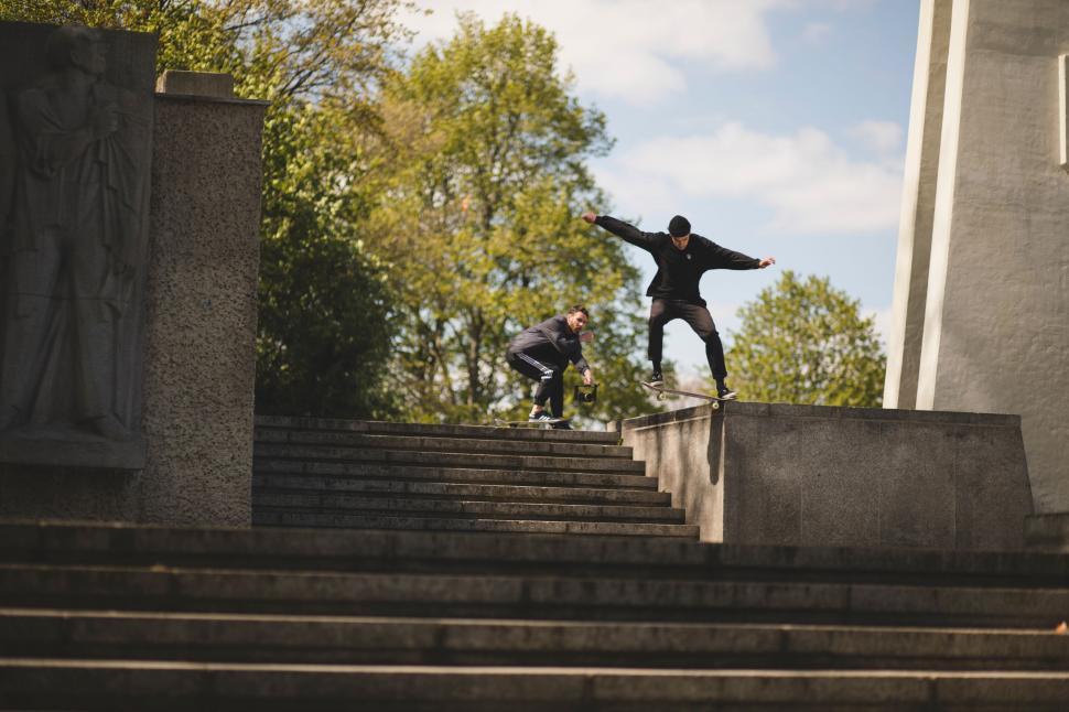 Free Image of Man Skateboarding Down Stairs 