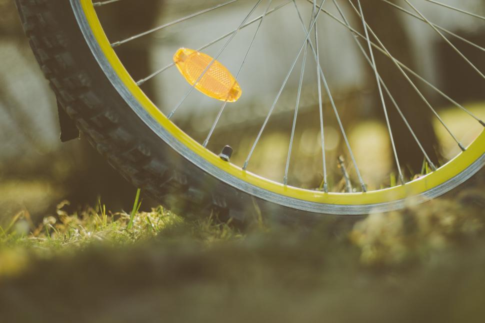Free Image of Close Up of a Bike Tire on the Ground 