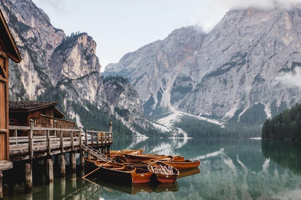 Free Image of Boat Docked at Mountain Lake 