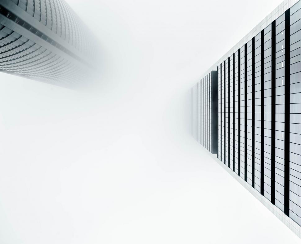 Free Image of Two Tall Buildings in Black and White 