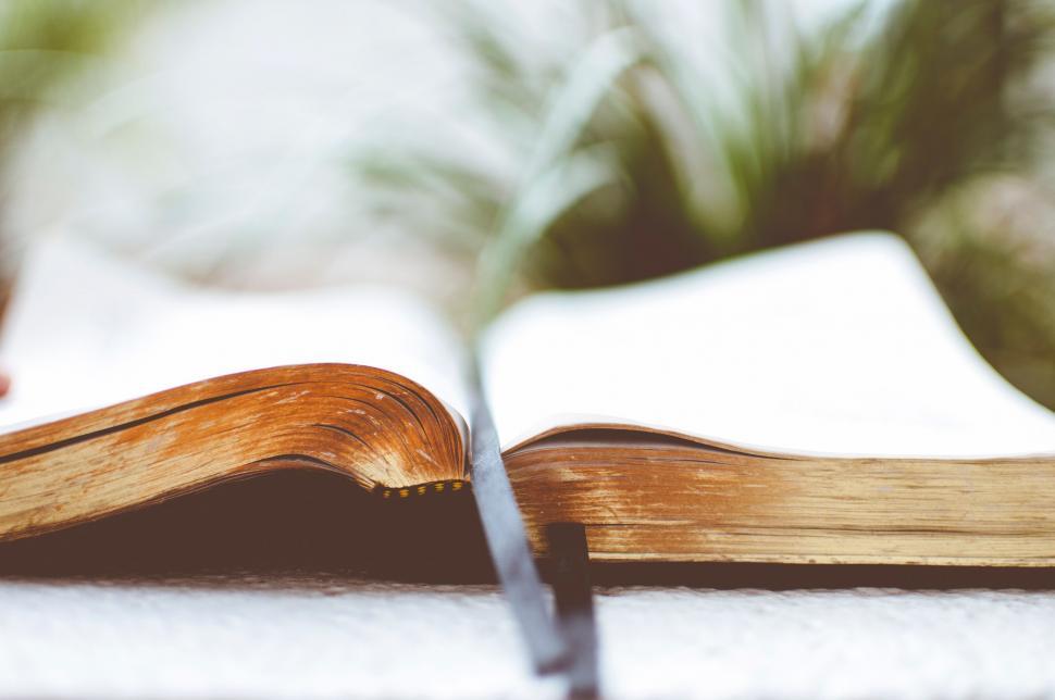 Free Image of Open Book on Table 