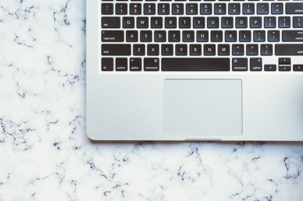 Free Image of Laptop Computer on Marble Table 