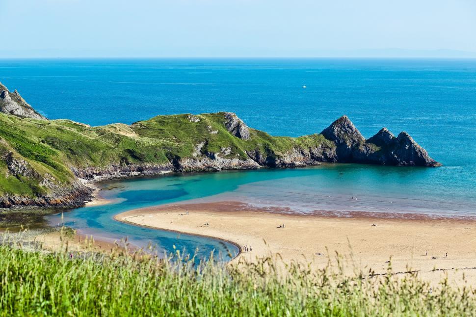 Free Image of Sandy Beach by the Water 