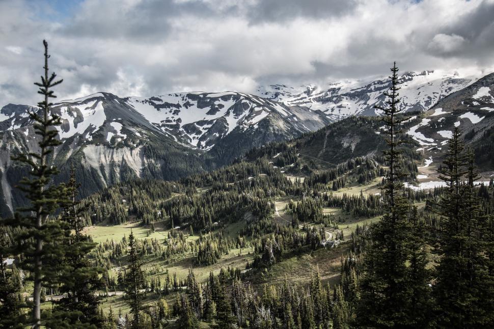 Free Image of Majestic Snow-Covered Mountain Range 