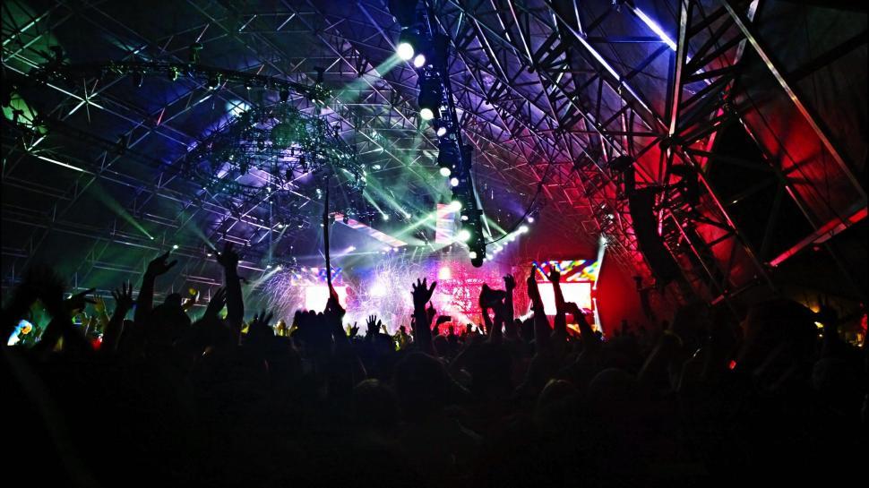 Free Image of Excited Audience Fills Concert Venue 