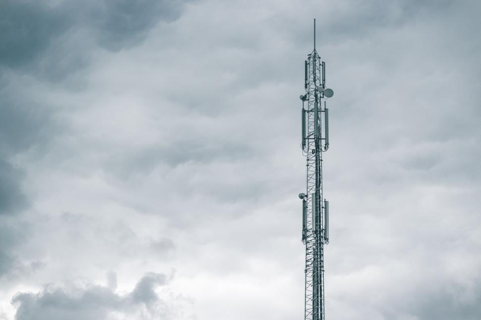 Free Image of Tall Tower Under Cloudy Sky 