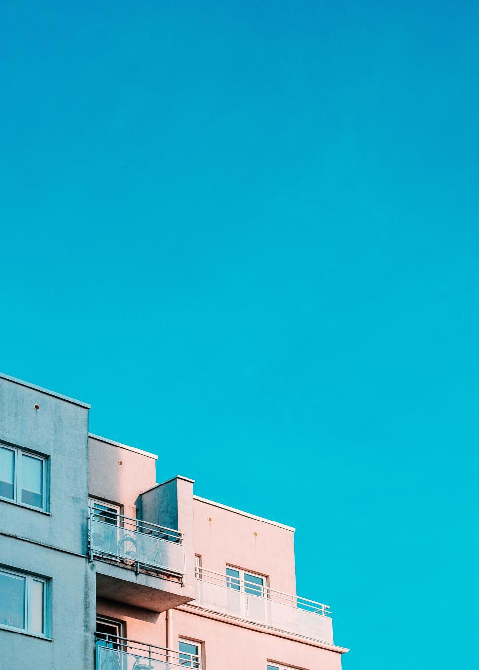 Free Image of Tall Building With Balconies and Rooftop Terraces 