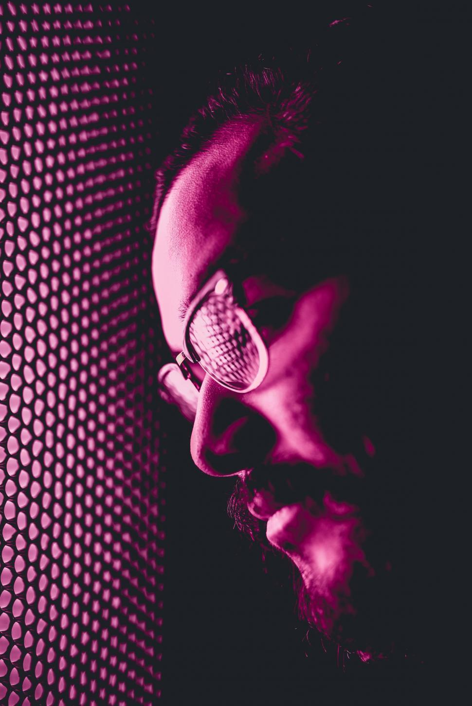 Free Image of Man Holding Microphone 