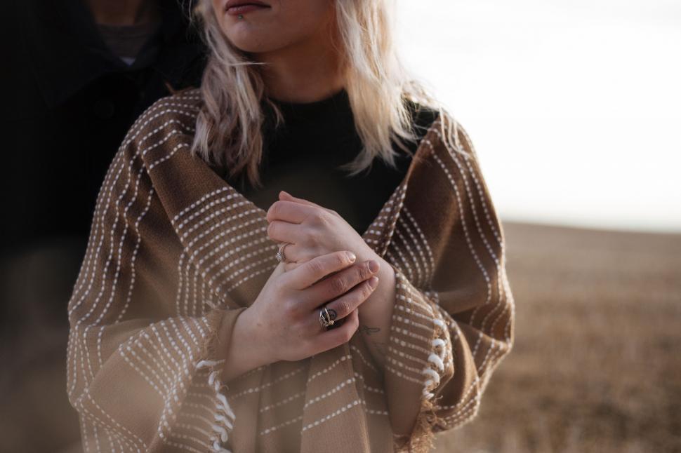 Free Image of Woman Standing in the Middle of a Field 
