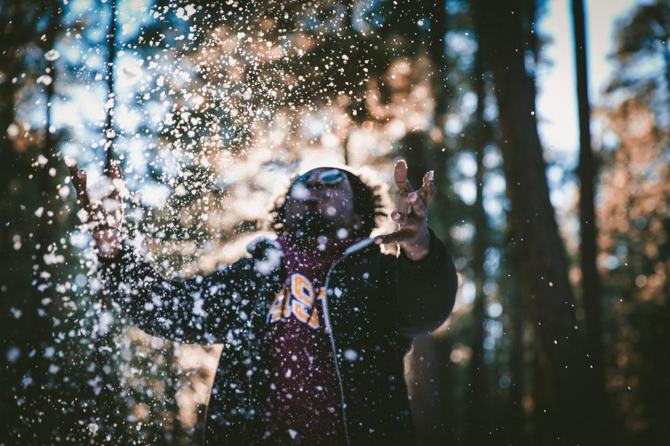 Free Image of Person Standing in Snowy Woods 