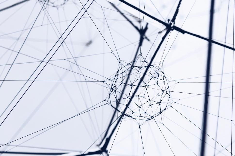 Free Image of Black and White Photo of Wires and a Ball 