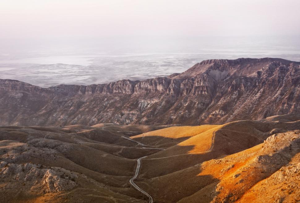 Free Image of Mountain Range With Winding Road 