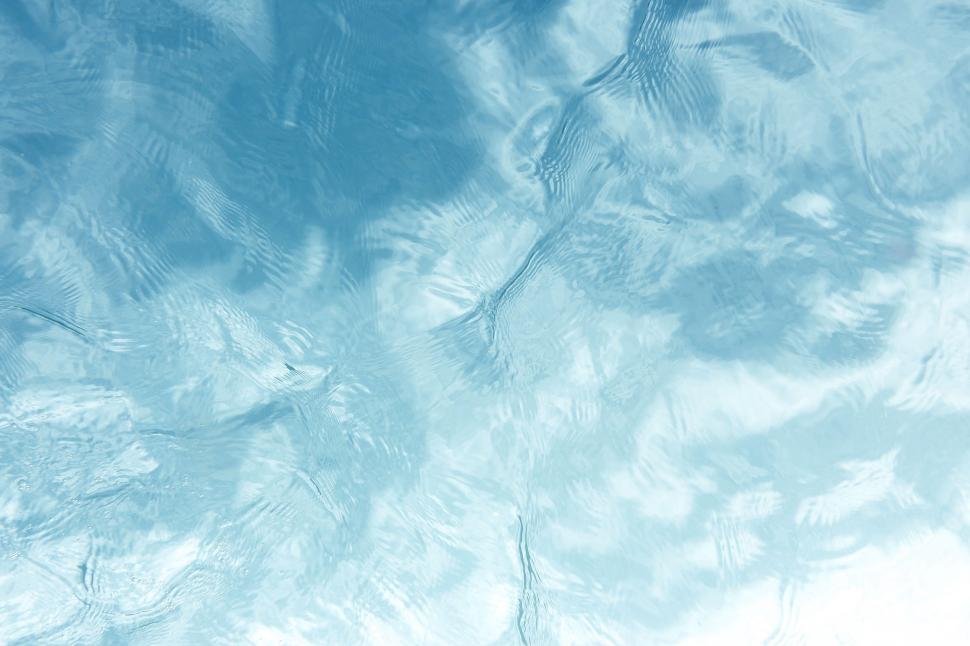 Frozen large ice cubes in droplets of water, Stock image