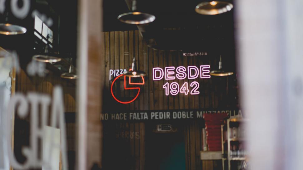 Free Image of A Restaurant With Sign Desde 1932 