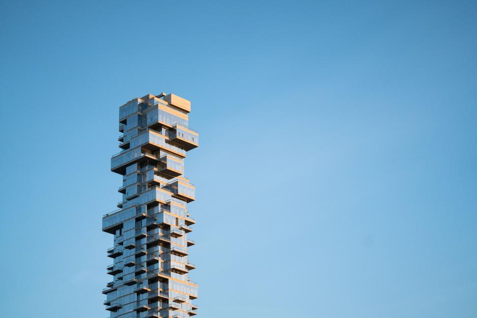 Free Image of Tall Building With Numerous Windows 