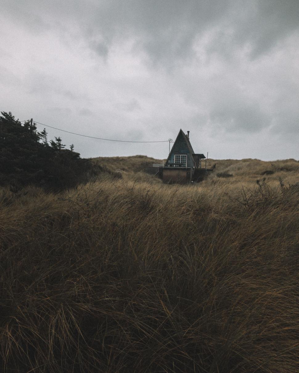 Free Image of House on Grass-Covered Hill 