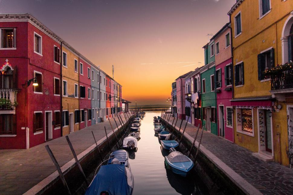 Free Image of Row of Boats on a Body of Water 