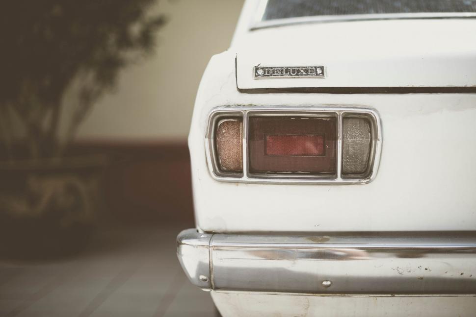 Free Image of Close Up of the Front of a White Car 