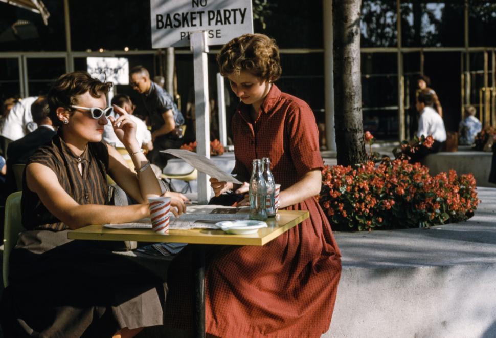 Free Image of A Man and a Woman Sitting at a Table 