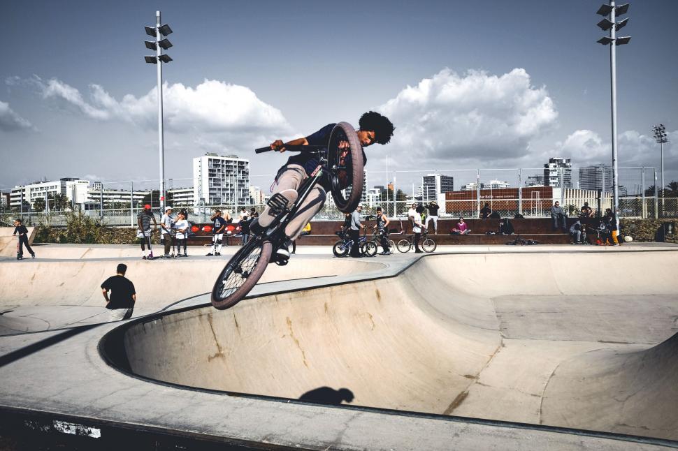 Free Image of Man Riding Skateboard Up Ramp 