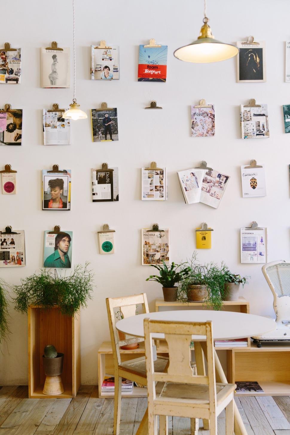 Free Image of Room With Table, Chairs, and Wall Pictures 