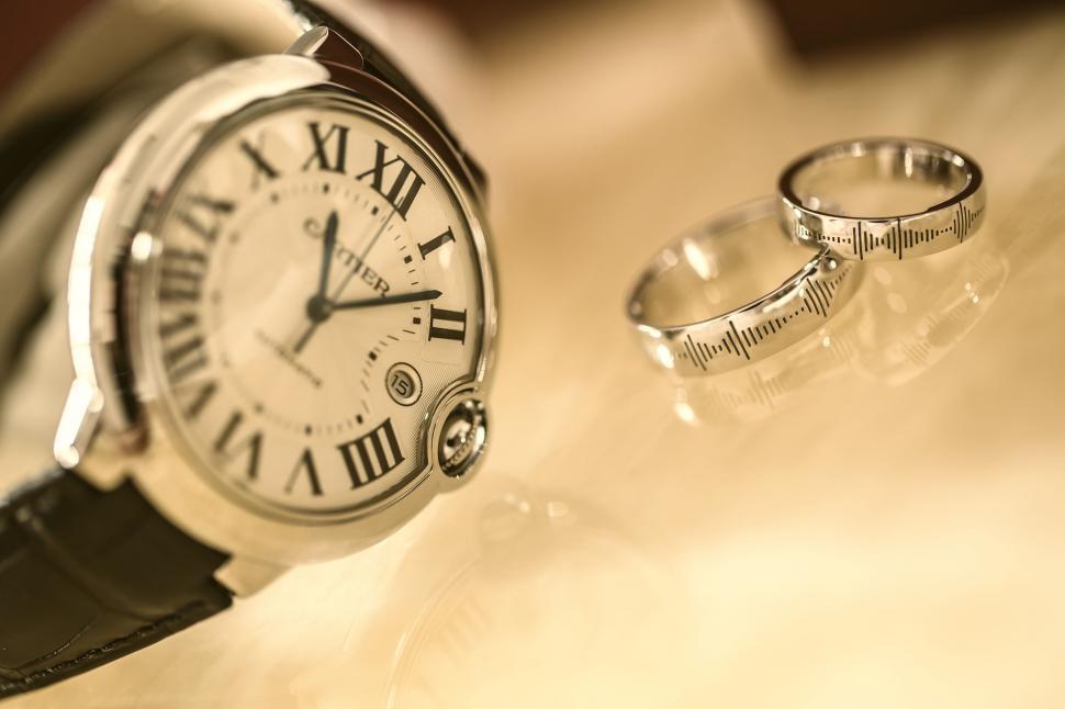 Free Image of Rings and Watch on a Surface 